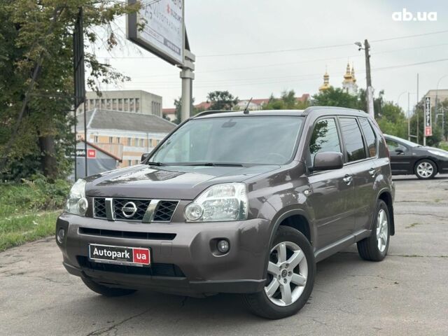 Коричневий Ніссан ІксТрейл, об'ємом двигуна 2 л та пробігом 228 тис. км за 10390 $, фото 1 на Automoto.ua