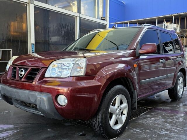 Червоний Ніссан ІксТрейл, об'ємом двигуна 2 л та пробігом 250 тис. км за 4499 $, фото 1 на Automoto.ua