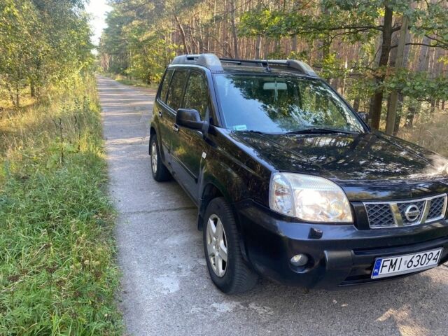 Красный Ниссан ИксТрейл, объемом двигателя 2.2 л и пробегом 335 тыс. км за 5008 $, фото 1 на Automoto.ua