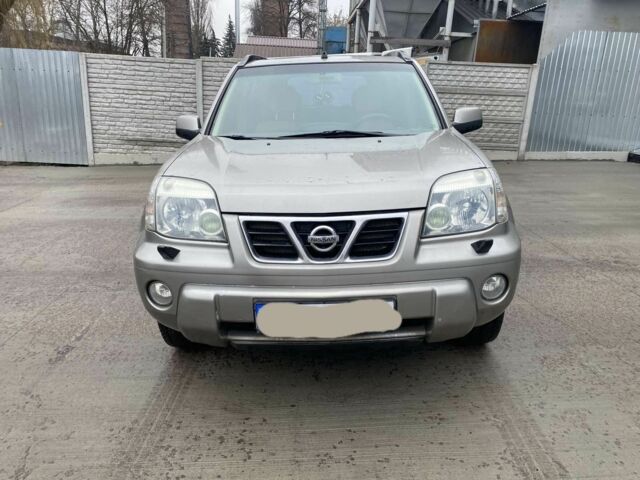 Сірий Ніссан ІксТрейл, об'ємом двигуна 2 л та пробігом 320 тис. км за 6250 $, фото 1 на Automoto.ua