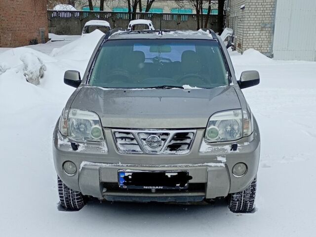 Серый Ниссан ИксТрейл, объемом двигателя 2 л и пробегом 320 тыс. км за 5800 $, фото 1 на Automoto.ua