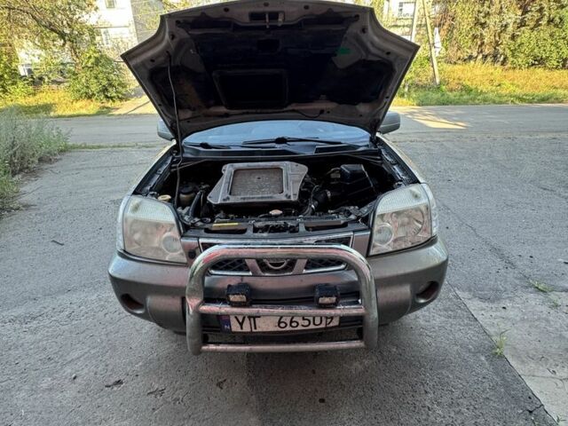 Серый Ниссан ИксТрейл, объемом двигателя 2.2 л и пробегом 265 тыс. км за 3550 $, фото 1 на Automoto.ua