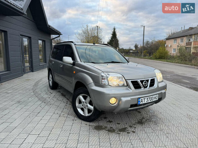 Серый Ниссан ИксТрейл, объемом двигателя 2 л и пробегом 249 тыс. км за 4999 $, фото 1 на Automoto.ua