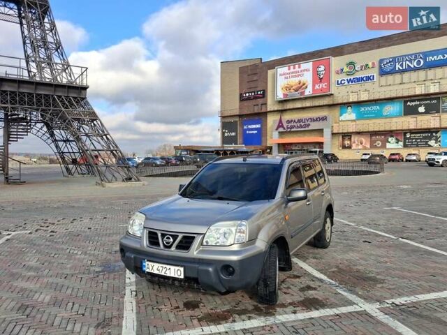 Серый Ниссан ИксТрейл, объемом двигателя 2.2 л и пробегом 295 тыс. км за 6400 $, фото 1 на Automoto.ua