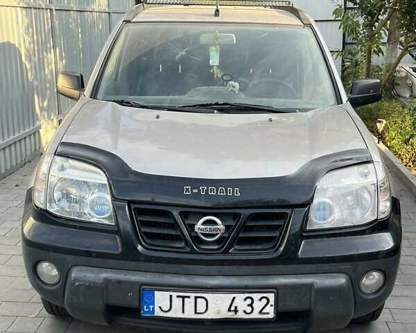 Сірий Ніссан ІксТрейл, об'ємом двигуна 2.2 л та пробігом 348 тис. км за 3600 $, фото 1 на Automoto.ua