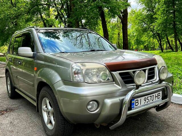 Серый Ниссан ИксТрейл, объемом двигателя 2.2 л и пробегом 323 тыс. км за 5800 $, фото 1 на Automoto.ua