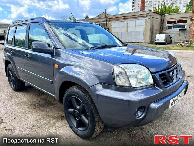 Серый Ниссан ИксТрейл, объемом двигателя 2.2 л и пробегом 218 тыс. км за 2800 $, фото 1 на Automoto.ua