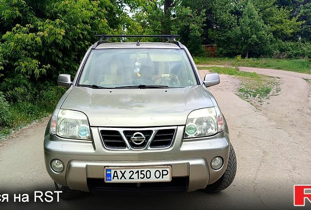 Серый Ниссан ИксТрейл, объемом двигателя 2 л и пробегом 258 тыс. км за 5999 $, фото 1 на Automoto.ua