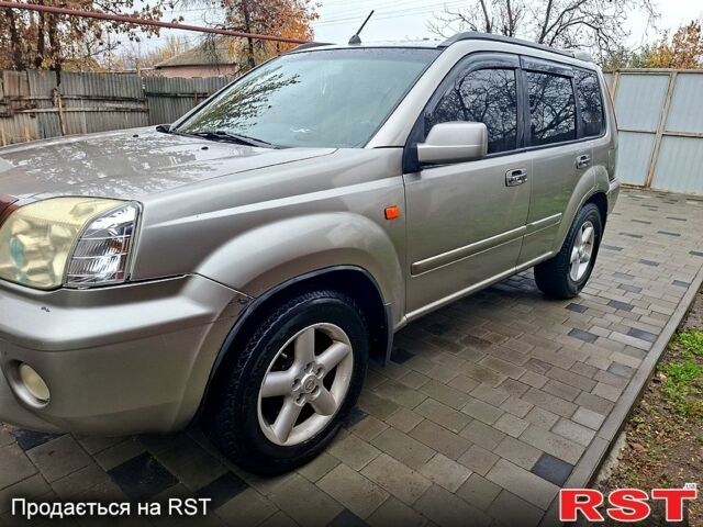 Серый Ниссан ИксТрейл, объемом двигателя 2.5 л и пробегом 286 тыс. км за 5800 $, фото 1 на Automoto.ua