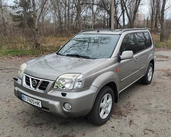 Сірий Ніссан ІксТрейл, об'ємом двигуна 2 л та пробігом 200 тис. км за 5900 $, фото 1 на Automoto.ua