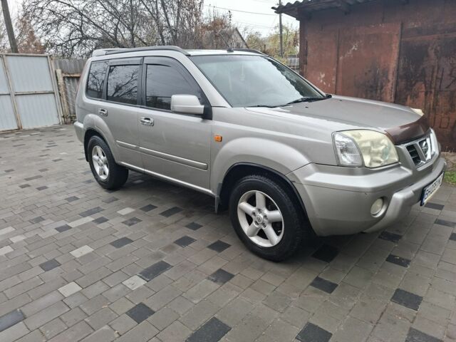 Серый Ниссан ИксТрейл, объемом двигателя 2.5 л и пробегом 286 тыс. км за 5800 $, фото 1 на Automoto.ua