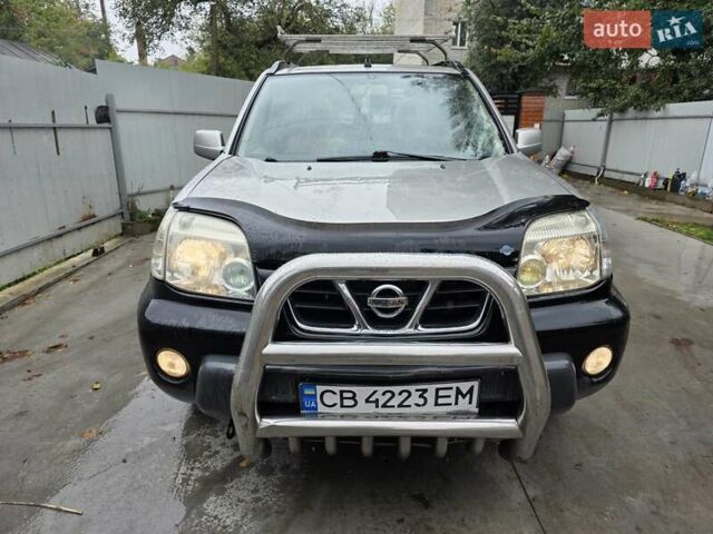 Сірий Ніссан ІксТрейл, об'ємом двигуна 2 л та пробігом 335 тис. км за 4800 $, фото 1 на Automoto.ua