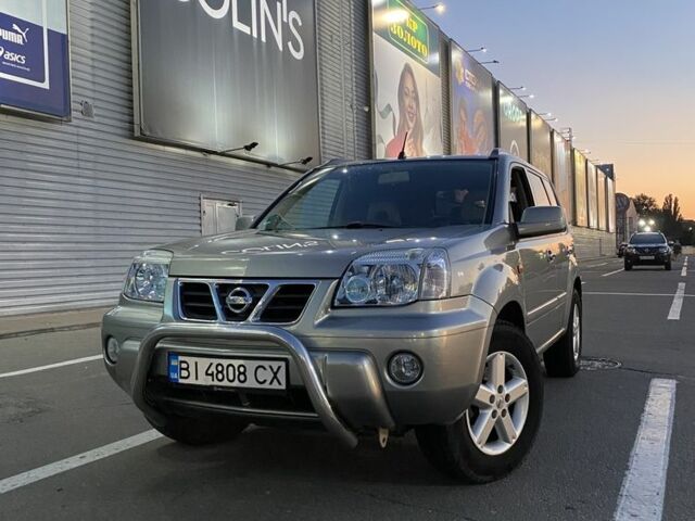 Сірий Ніссан ІксТрейл, об'ємом двигуна 2.5 л та пробігом 128 тис. км за 5700 $, фото 1 на Automoto.ua