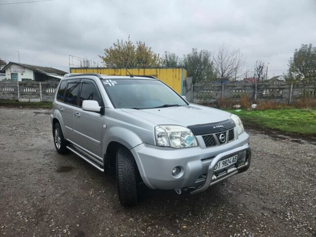 Сірий Ніссан ІксТрейл, об'ємом двигуна 2 л та пробігом 450 тис. км за 7000 $, фото 1 на Automoto.ua