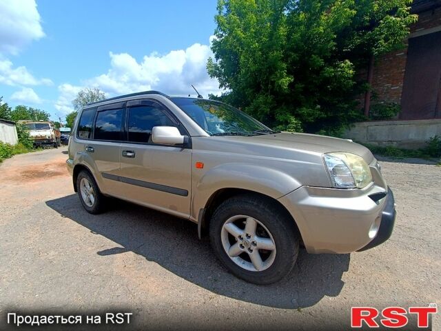 Серый Ниссан ИксТрейл, объемом двигателя 2 л и пробегом 275 тыс. км за 6300 $, фото 1 на Automoto.ua