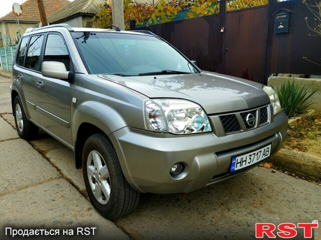 Серый Ниссан ИксТрейл, объемом двигателя 2.2 л и пробегом 240 тыс. км за 6700 $, фото 1 на Automoto.ua