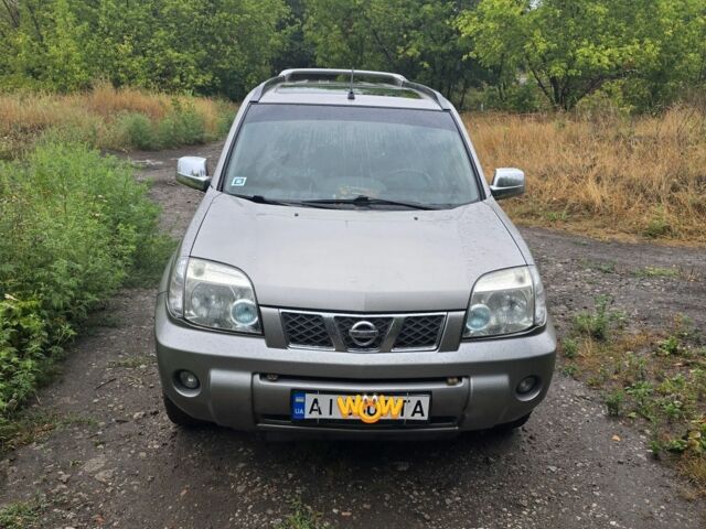 Сірий Ніссан ІксТрейл, об'ємом двигуна 0 л та пробігом 255 тис. км за 4505 $, фото 1 на Automoto.ua