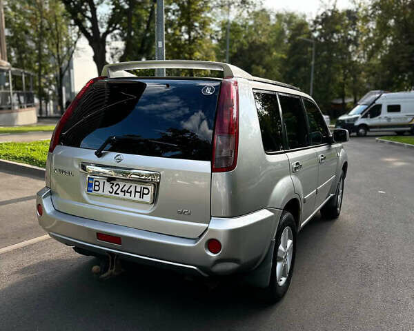 Серый Ниссан ИксТрейл, объемом двигателя 2.18 л и пробегом 315 тыс. км за 8300 $, фото 1 на Automoto.ua