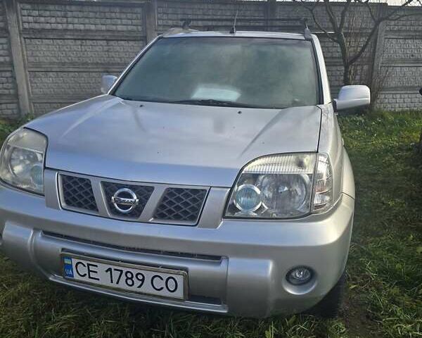 Серый Ниссан ИксТрейл, объемом двигателя 2.5 л и пробегом 240 тыс. км за 4750 $, фото 1 на Automoto.ua