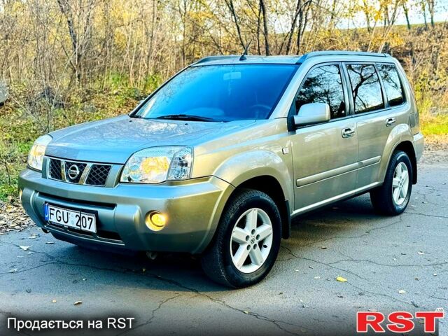 Серый Ниссан ИксТрейл, объемом двигателя 2.2 л и пробегом 238 тыс. км за 4250 $, фото 1 на Automoto.ua