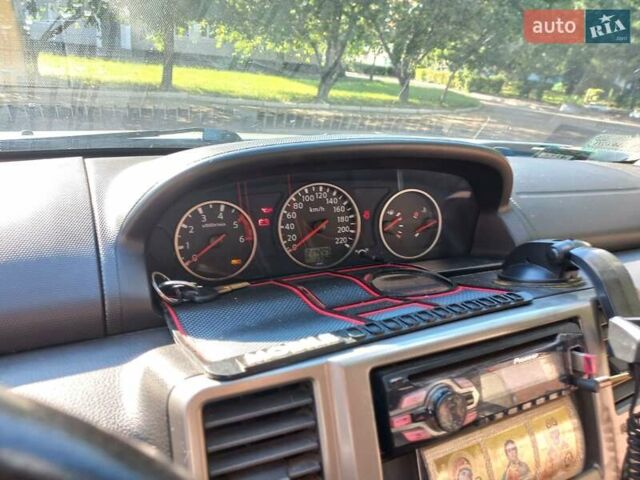 Серый Ниссан ИксТрейл, объемом двигателя 2.18 л и пробегом 300 тыс. км за 5500 $, фото 1 на Automoto.ua