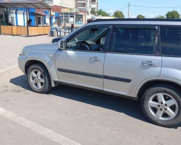 Серый Ниссан ИксТрейл, объемом двигателя 2 л и пробегом 239 тыс. км за 5800 $, фото 1 на Automoto.ua