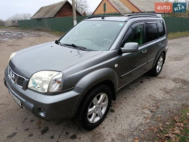 Сірий Ніссан ІксТрейл, об'ємом двигуна 2.49 л та пробігом 211 тис. км за 7500 $, фото 1 на Automoto.ua
