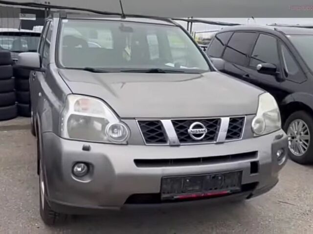 Серый Ниссан ИксТрейл, объемом двигателя 2 л и пробегом 320 тыс. км за 3495 $, фото 1 на Automoto.ua