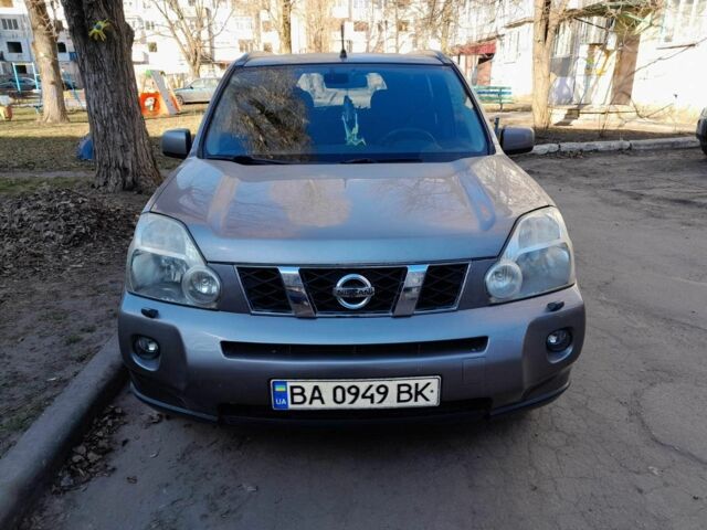 Серый Ниссан ИксТрейл, объемом двигателя 2 л и пробегом 195 тыс. км за 8300 $, фото 1 на Automoto.ua