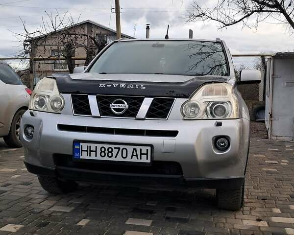 Серый Ниссан ИксТрейл, объемом двигателя 2 л и пробегом 233 тыс. км за 12222 $, фото 1 на Automoto.ua