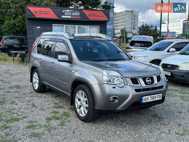 Сірий Ніссан ІксТрейл, об'ємом двигуна 2 л та пробігом 230 тис. км за 11500 $, фото 1 на Automoto.ua