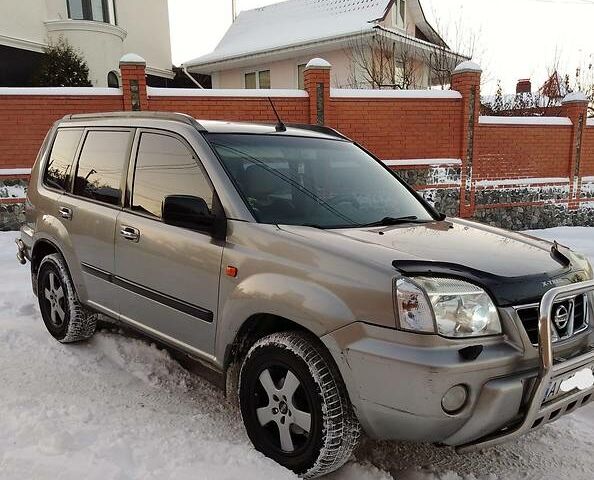 Сірий Ніссан ІксТрейл, об'ємом двигуна 2.5 л та пробігом 263 тис. км за 7500 $, фото 1 на Automoto.ua