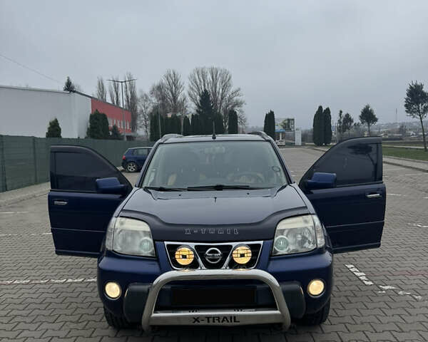 Синий Ниссан ИксТрейл, объемом двигателя 2 л и пробегом 222 тыс. км за 4700 $, фото 1 на Automoto.ua