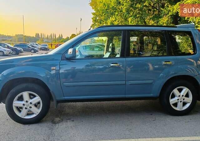 Синій Ніссан ІксТрейл, об'ємом двигуна 2 л та пробігом 312 тис. км за 7200 $, фото 1 на Automoto.ua