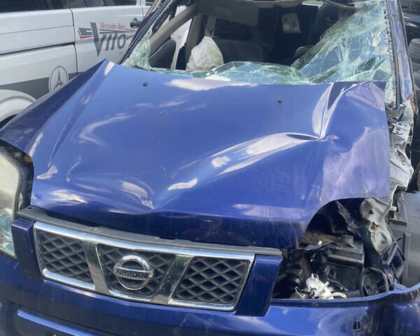 Синий Ниссан ИксТрейл, объемом двигателя 2.49 л и пробегом 150 тыс. км за 1800 $, фото 1 на Automoto.ua