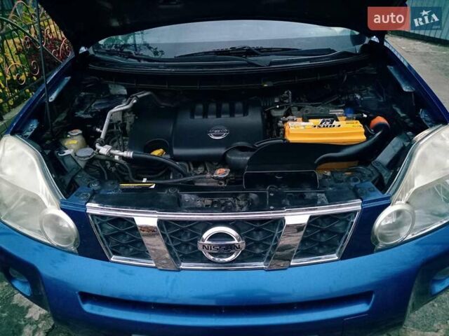 Синий Ниссан ИксТрейл, объемом двигателя 2 л и пробегом 162 тыс. км за 10600 $, фото 1 на Automoto.ua