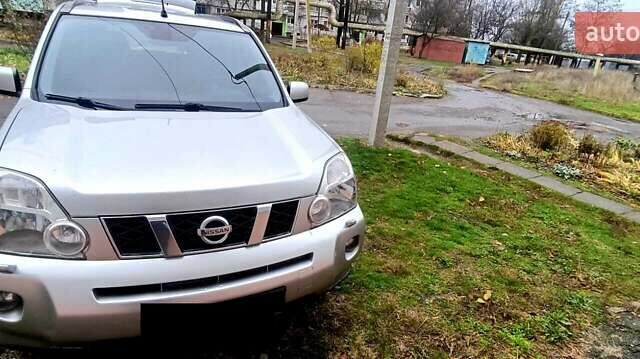 Синій Ніссан ІксТрейл, об'ємом двигуна 2 л та пробігом 208 тис. км за 9500 $, фото 1 на Automoto.ua