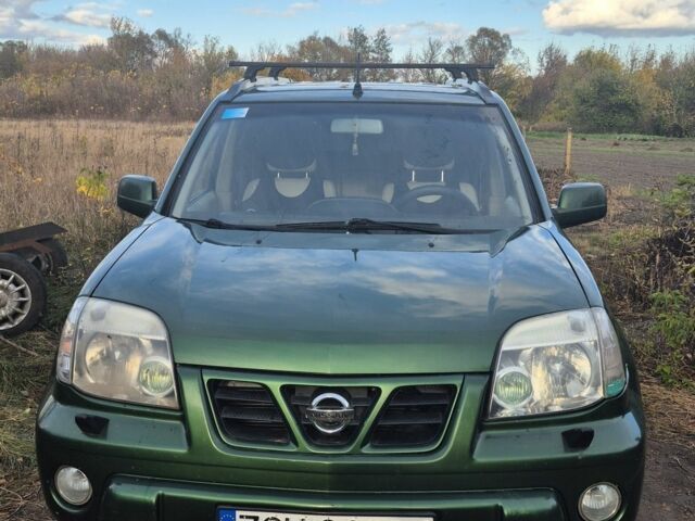 Зеленый Ниссан ИксТрейл, объемом двигателя 2 л и пробегом 334 тыс. км за 3974 $, фото 1 на Automoto.ua