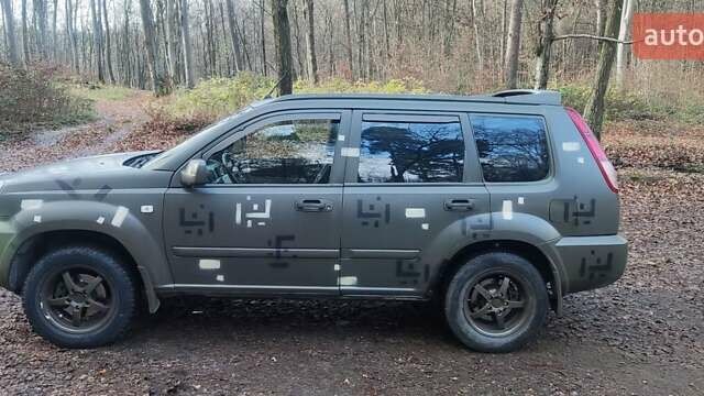 Зелений Ніссан ІксТрейл, об'ємом двигуна 2 л та пробігом 300 тис. км за 5200 $, фото 1 на Automoto.ua