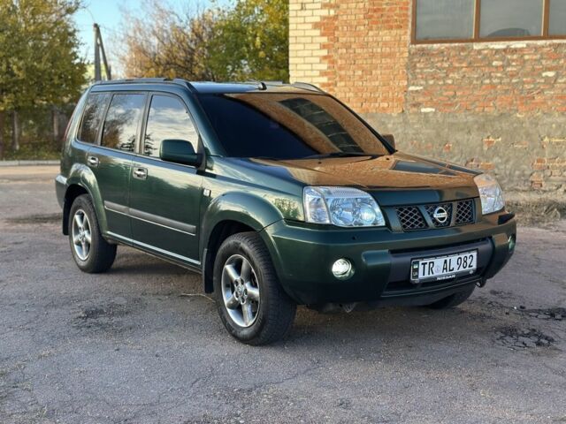 Зеленый Ниссан ИксТрейл, объемом двигателя 2.2 л и пробегом 394 тыс. км за 4700 $, фото 1 на Automoto.ua
