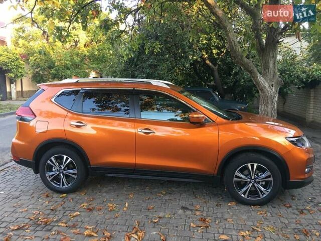 Оранжевый Ниссан ИксТрейл, объемом двигателя 2 л и пробегом 73 тыс. км за 20000 $, фото 1 на Automoto.ua