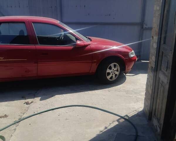 Красный Опель 1.8 Liter, объемом двигателя 1.8 л и пробегом 300 тыс. км за 2400 $, фото 1 на Automoto.ua