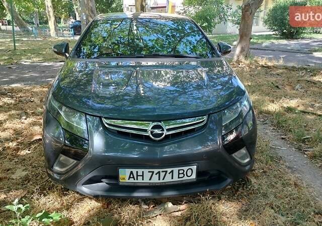 Черный Опель Ампера, объемом двигателя 1.4 л и пробегом 160 тыс. км за 9000 $, фото 1 на Automoto.ua