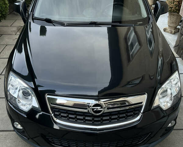 Черный Опель Антара, объемом двигателя 2.23 л и пробегом 158 тыс. км за 11000 $, фото 1 на Automoto.ua