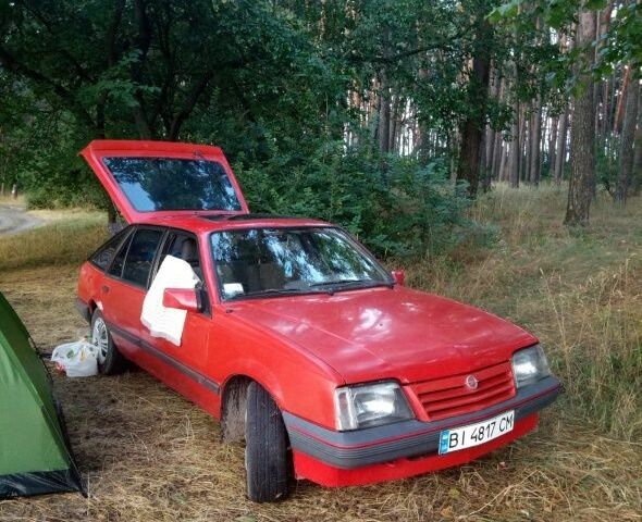 Красный Опель Аскона, объемом двигателя 1.8 л и пробегом 100 тыс. км за 677 $, фото 1 на Automoto.ua