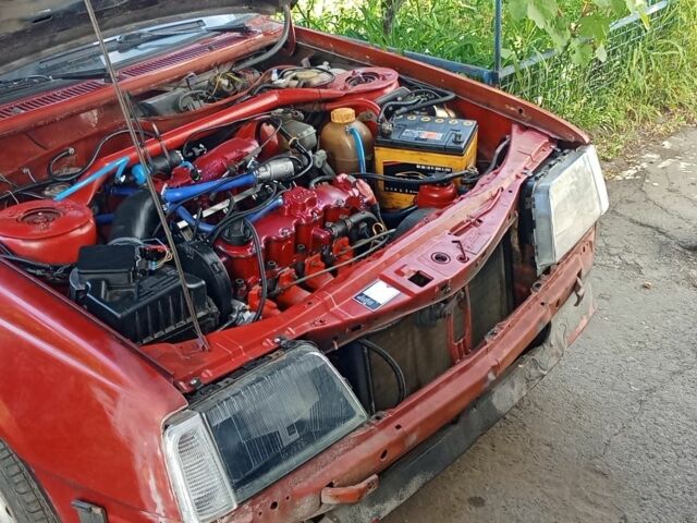 Красный Опель Аскона, объемом двигателя 2 л и пробегом 400 тыс. км за 1122 $, фото 1 на Automoto.ua