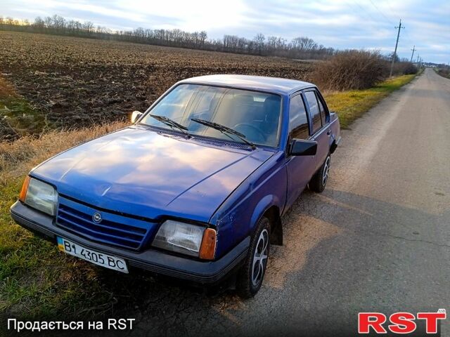 Синий Опель Аскона, объемом двигателя 1.6 л и пробегом 230 тыс. км за 550 $, фото 1 на Automoto.ua