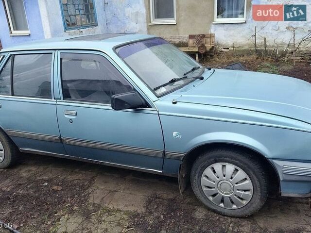 Синий Опель Аскона, объемом двигателя 1.6 л и пробегом 200 тыс. км за 729 $, фото 1 на Automoto.ua