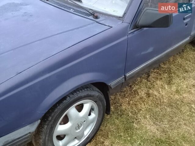 Синий Опель Аскона, объемом двигателя 1.8 л и пробегом 275 тыс. км за 650 $, фото 1 на Automoto.ua