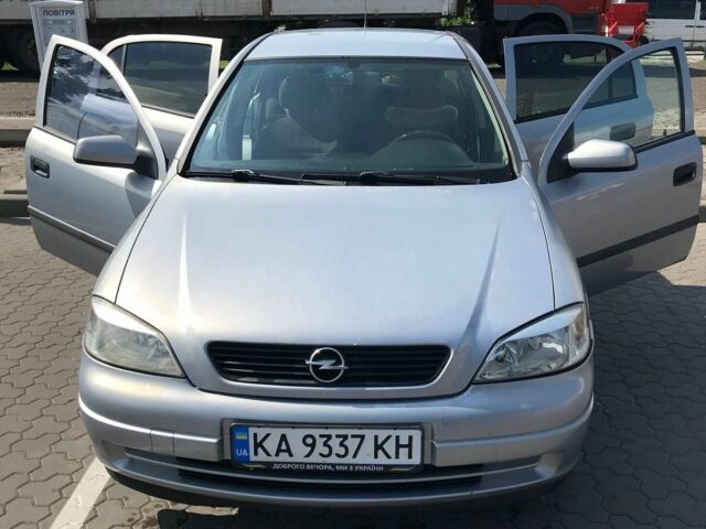 Серый Опель Астра Г, объемом двигателя 1.6 л и пробегом 304 тыс. км за 2999 $, фото 1 на Automoto.ua
